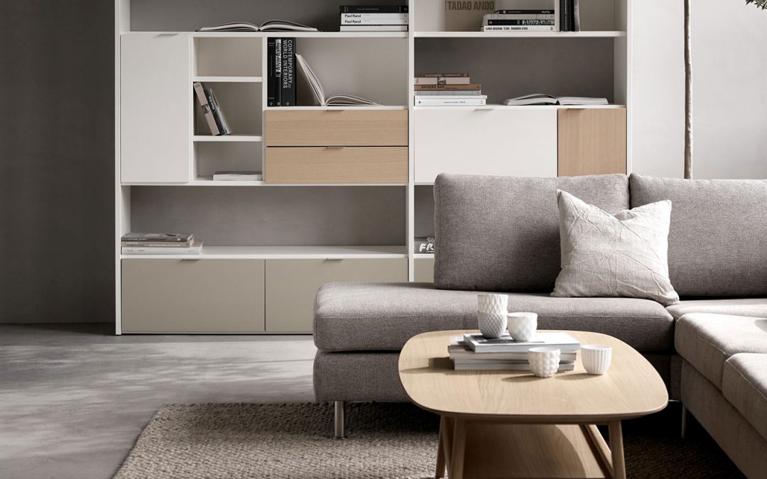 Grey sofa with wooden coffee table and shelves