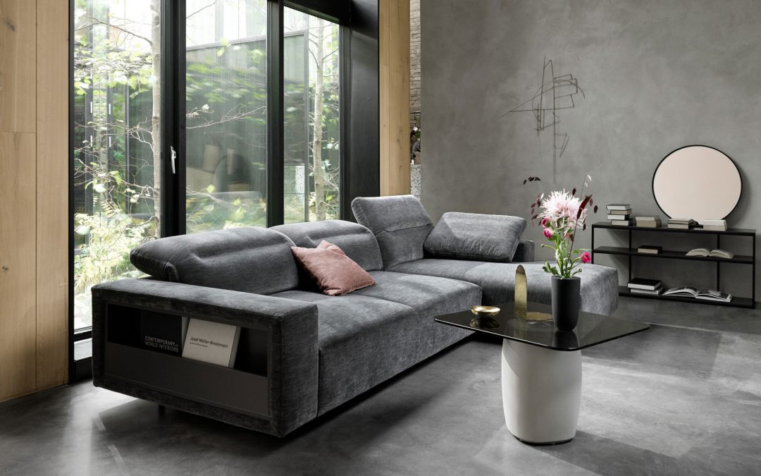 Hampton sofa with adjustable headrests and integrated armrest storage