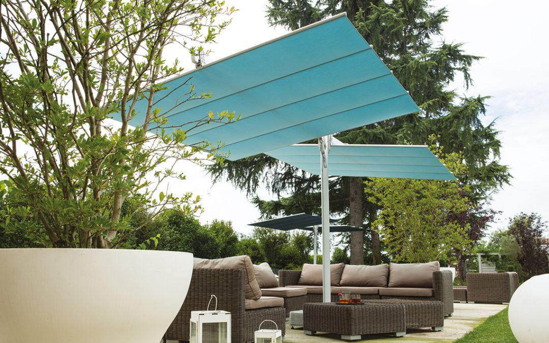 Twin umbrella systems to shade large areas