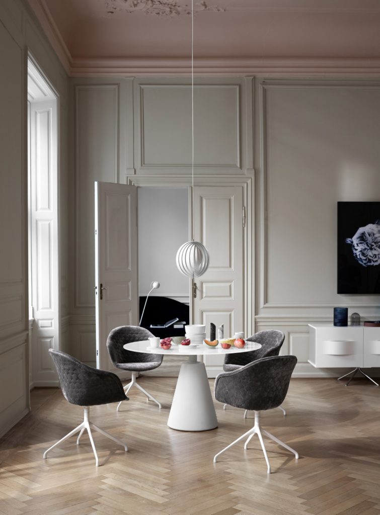 Madrid dining table and Adelaide chairs in quilted velvet by BoConcept